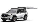 Silver SUV with a Alu-Cab 270 Shadow Awning 2m mounted to a Front Runner roof rack. Camp4x4. camp 4x4