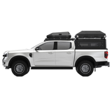 White Off-road bukkie / truck with a Alu-Cab RT2 2 sleeper rooftop tent and storage boxes on a Front unner roof rack and Alu-Cab Contour canopy. Camp4x4. camp 4x4, overlanding, camping. Double Cab. Single Cab. Extra Cab 