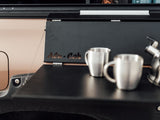 Metallic coffee mugs on a black Alu-Cab Side Slide Prep Table on a Camp4x4 vehicle