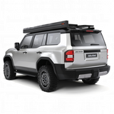 Silver Land Cruiser with an Alu-Cab 270 Shadow Awning mounted to a roof rack. Camp4x4. camp 4x4, overlanding, camping.