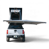 Camping vehicle with extended Alu-Cab 270 Shadow Awning RHS and a hard shell Gen3.R rooftop tent. Camp4x4. camp 4x4, overlanding. Double Cab. Single Cab. Extra Cab