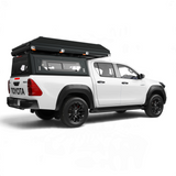 White bukkie / truck with an Alu-Cab RT4, 4 sleeper rooftop tent and ladder on a Contour Canopy. Internal view of the Alu-Cab RT-4S 4 sleeper tent. Camp4x4. camp 4x4, overlanding, camping. Double Cab. Single Cab. Extra Cab. Off-road