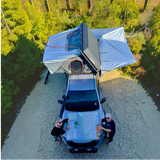Camp4x4.co.za Alu-Cab 270 Shadow Awning 2.5m mounted on an off-road vehicle with a Alu-Cab RT-4S 4 sleeper rooftop tent, in a camp site