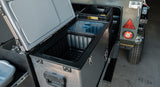 Trailer rental featuring a camping fridge freezer.