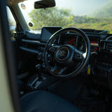Interior of a Camp4x4 Rental vehicle with steering wheel and dashboard view