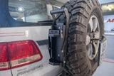 Alu-cab can crusher mounted onto the spare wheel of a 4x4 spare wheel