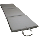 A MEERKAT Canvas Folding Mattress, unfolded and displayd on a white background