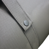A close up view of the MEERKAT Canvas Roll-Up Mattress, showing the quality canvas material and strap clip, displayed on a white background