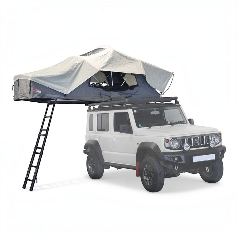 A Front Runner Feather-Lite II Rooftop Tent in an opened up position, on a Campx4 rental vehicle, on a white background