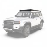 White Toyota 4x4 with a Front Runner Toyota Land Cruiser Prado 250 (2024-Current) Slimsport Roof Rack Kit on a white background