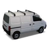A white panel van shown from a three-quarter rear angle on a light gray studio background, fitted with the Front Runner Suzuki Eeco (2023-Current) Triple Load Bar Kit.