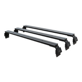 A Front Runner Suzuki Eeco (2023-Current) Triple Load Bar Kit, arranged diagonally on a plain white background.
