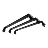 A view from under the Front Runner Suzuki Eeco (2023-Current) Triple Load Bar Kit, shown against a plain white background.