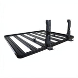 A black Slimline II roof rack with the Front Runner Vertical Surfboard Carrier mounted, shown on a plain white background.