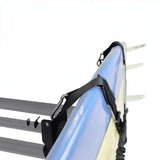 A close-up of a blue surfboard secured withFront Runner Vertical Surfboard Carrier, on a roof rack against a white background.
