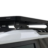 Land Rover Defender with the Front Runner Land Rover Defender 90 (2020-Current) Slimline II Roof Rack Contour Kit on a white background