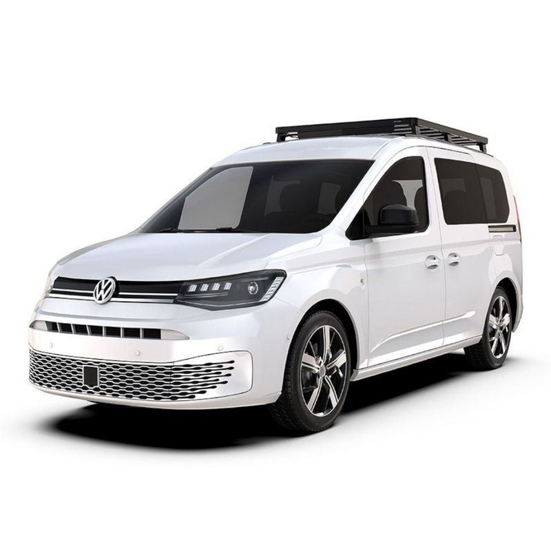 A white Volkswagen Caddy van with a Front Runner Series Volkswagen Caddy (2022-Current) Slimline II Roof Rack Kit, shown from a three-quarter front angle on a clean white background.