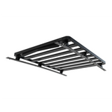 A black Front Runner Series Volkswagen Caddy (2022-Current) Slimline II Roof Rack Kit, shown at an angle against a plain white background.