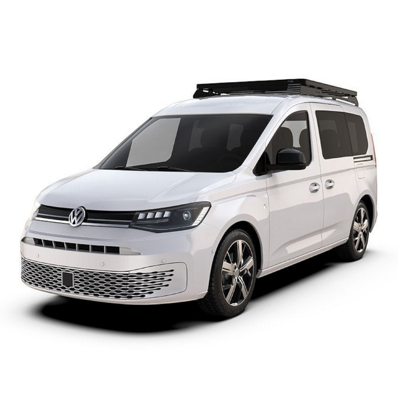 A white Volkswagen Caddy camper van with a black Front Runner Series Volkswagen Caddy / Ford Transit/Tourneo Connect SWB (2020-Current) Slimline II Roof Rack Kit, shown from a three-quarter front angle on a clean white background.