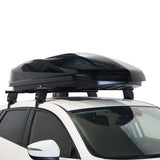A black Front Runner Cargo Carrier / 450 hardtop car roof box mounted on a white vehicle's roof rack, shown against a plain white background.