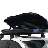 A black Front Runner Cargo Carrier / 450  hardtop car roof box mounted on a white vehicle's roof rack, shown with the door open, against a plain white background.