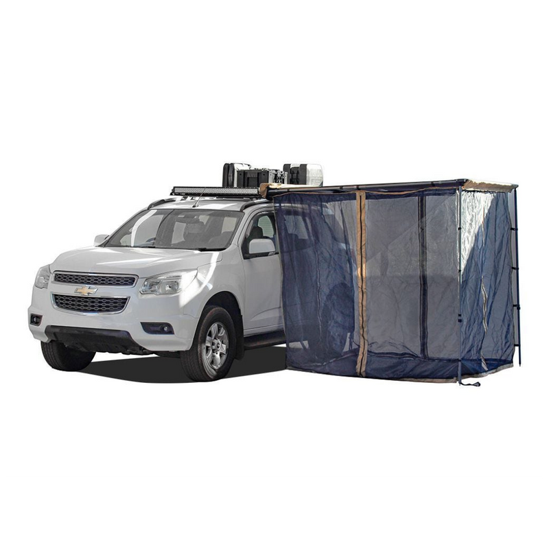 A white SUV with a dark blue Front Runner Series Easy-Out Awning Mosquito Net for a 2M or 2.5M awning, attached to the side, shown on a plain white background.