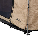 Close-up of a beige and black Front Runner Series Easy-Out Awning Room for a 2m or 2.5m Awning, with a dark mesh window, black base trim, and a silver support pole. The printed logo reads FRONT RUNNER.