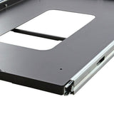 Close-up of a black Front Runner Fridge Slide, with a silver metal side rail and a cutout opening, shown on a white background.