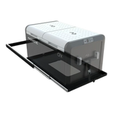 A Dometic CFX Fridge, shown in a semi-transparent rendering with its black Front Runner Fridge Slide for a 80 to 90L Fridge on a white background