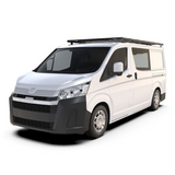 A white van with a Front Runner Toyota HiAce LWB (2019-Current) Slimpro Roof Rack Kit fitted, on a white background