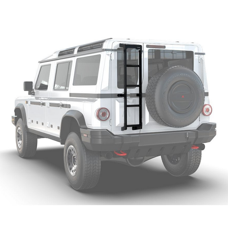 A white off-road vehicle shown from the rear three-quarter angle on a light gray studio background, with a Front Runner Ineos Grenadier (2022-Current) Ladder leading up to the back door and a spare tire mounted on the rear.