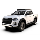 A white Isuzu double-cab pickup truck shown from a three-quarter front angle on a clean white background. The truck features a black front grille with the Isuzu logo, black wheel arches, a black Front Runner Series Isuzu D-Max (2020-Current) Slimline II Roof Rack Kit / Low Profile, and black multi-spoke wheels.