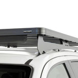 A Front Runner Series Isuzu MU-X (2017-2020) Slimline II Roof Rack Kit mounted to the roof of a white vehicle, shown against a clean white background.