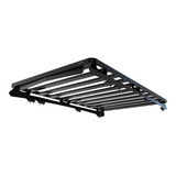 A black Front Runner Toyota Land Cruiser 300 Slimline II Roof Rack Kit shown from an elevated perspective against a solid white background.