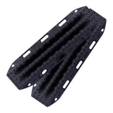 A pair of black MAXTRAX XTREME off-road vehicle floor mats with textured tread patterns and mounting holes, shown on a plain white background.