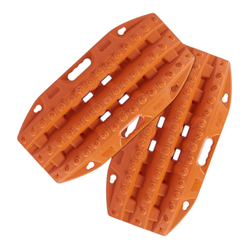 Two orange MAXTRAX Mini and Jaxbase Combo traction boards with textured grip ridges and cutout handles, shown on a plain white background.