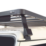 Close up view of the Front Runner Land Rover Defender 110 (1983-2016) Slimline II Roof Rack Kit / Tall on a vehicle
