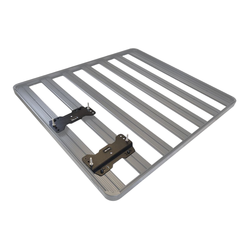 A gray aluminum slatted mounting plate with two black metal Front Runner Series Recovery Device Mounting Kit brackets attached, shown on a plain white background.
