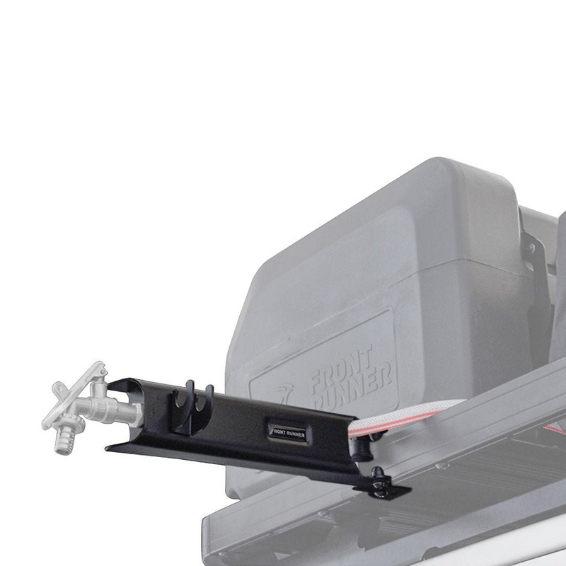 A close-up of a black roof-mounted Front Runner Tap Extension Bracket attached to a faded out vehicle roof rack, with a small visible Front Runner logo on the bracket.