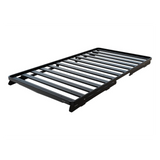 A black Front Runner Volkswagen T6/T6.1 Caravelle Transporter SWB (2015-Current) Slimline II Roof Rack Kit, shown at an angle on a plain white background.