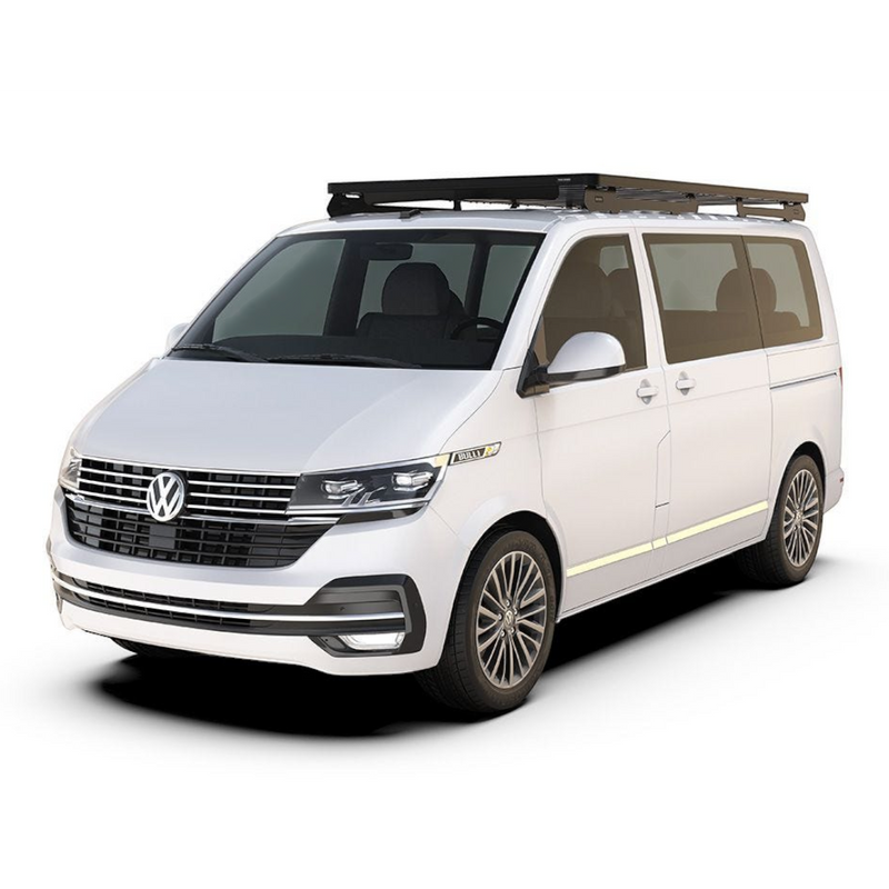 A white Volkswagen camper van with a black Front Runner Volkswagen T6/T6.1 Caravelle Transporter SWB (2015-Current) Slimline II Roof Rack Kit, shown from a three-quarter front angle on a clean white background.