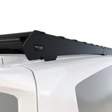 Black Front Runner Volkswagen T7 Transporter Caravelle LWB (2025-Current) Slimsport Roof Rack Kit / Light Bar Ready system on a white vehicle