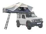 White Suzuki Jimny with a Front Runner Feather-Lite II Rooftop Tent on a white background. Camp 4x4