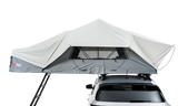 Front Runner Feather-Lite II Rooftop Tent attached to a car on a white background. camp 4x4