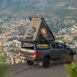 Toyota Hilux double cab fitted with Alu-Cab Gen3.R rooftop tent  a 270 degree Shadow awning and a contour canopy. Camp4x4. camp 4x4, overlanding, camping. Off-road
