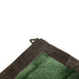 Close-up of a MEERKAT Netted Ground Sheet, a green mesh material corner with dark brown stitched edging and a metal grommet, shown on a plain white background.