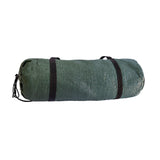 A rolled-up green textured MEERKAT Netted Ground Sheet with black straps and a black drawstring, shown against a plain white background.