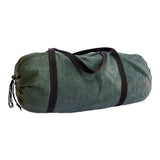 A green rectangular 3 x 6 m MEERKAT Netted Ground Sheet, rolled up and packed into a green mesh carry bag with a draw string, displayed on a plain white background.