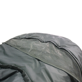 Close-up of a dark gray waterproof MEERKAT Contoured Hood Military Sleeping Bag (0°C) fabric with a mesh panel and zipper, shown against a plain white background.