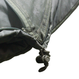 Close-up detail of a gray waterproof MEERKAT Contoured Hood Military Sleeping Bag (0°C) zipper with a drawcord and plastic slider, shown against a plain white background.